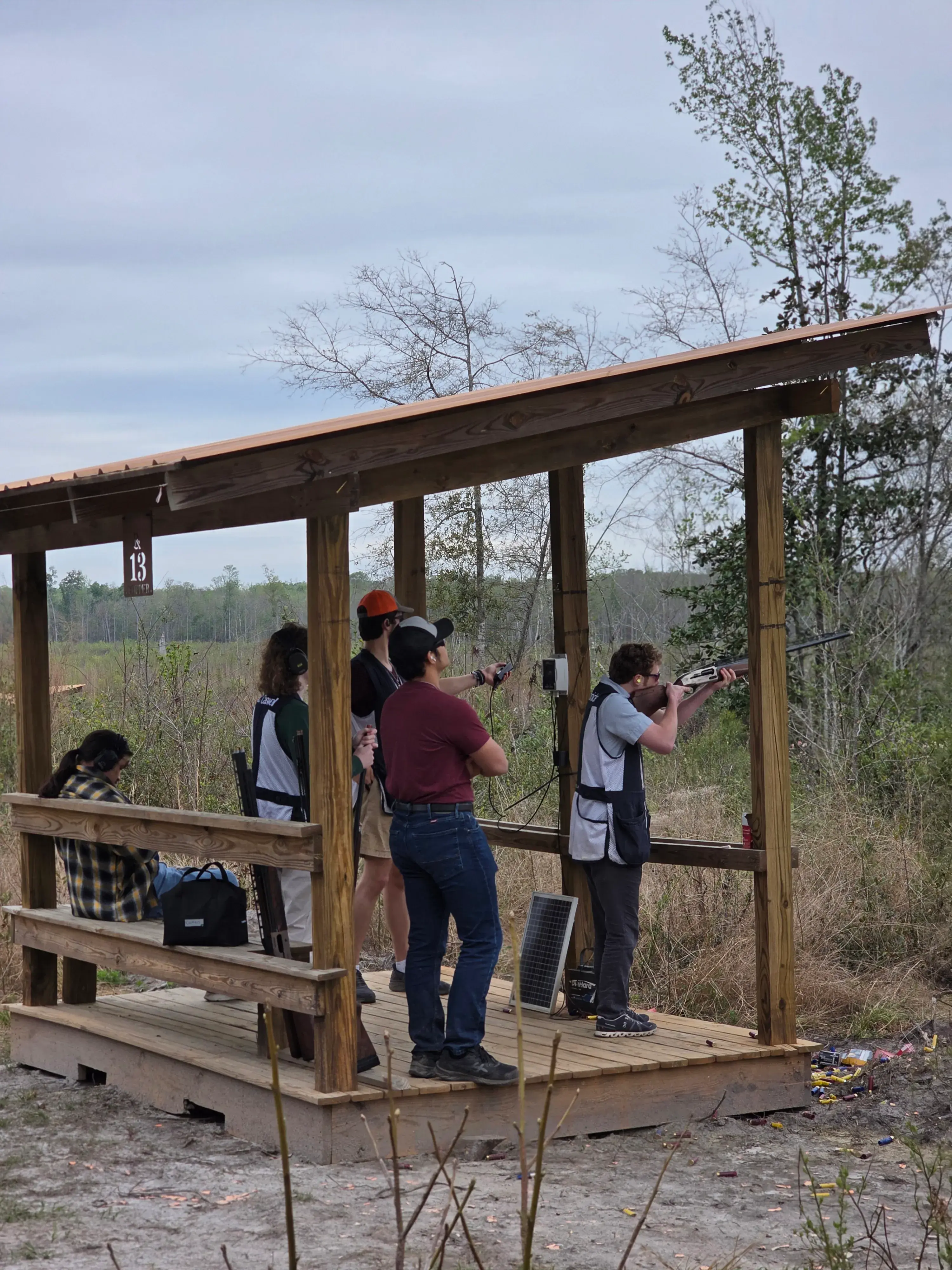 Group of shooters at a covered station