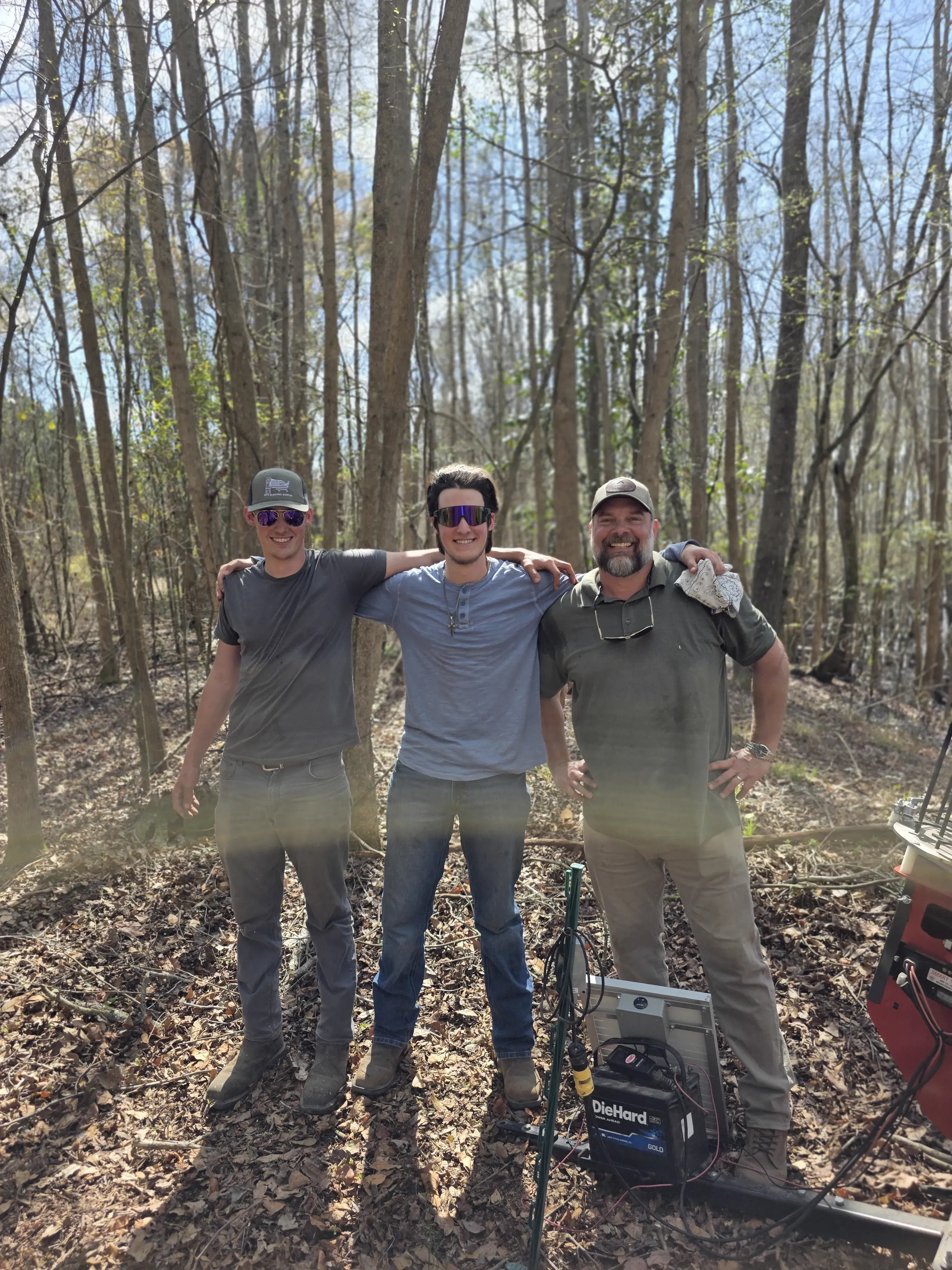 The crew posing together on the property