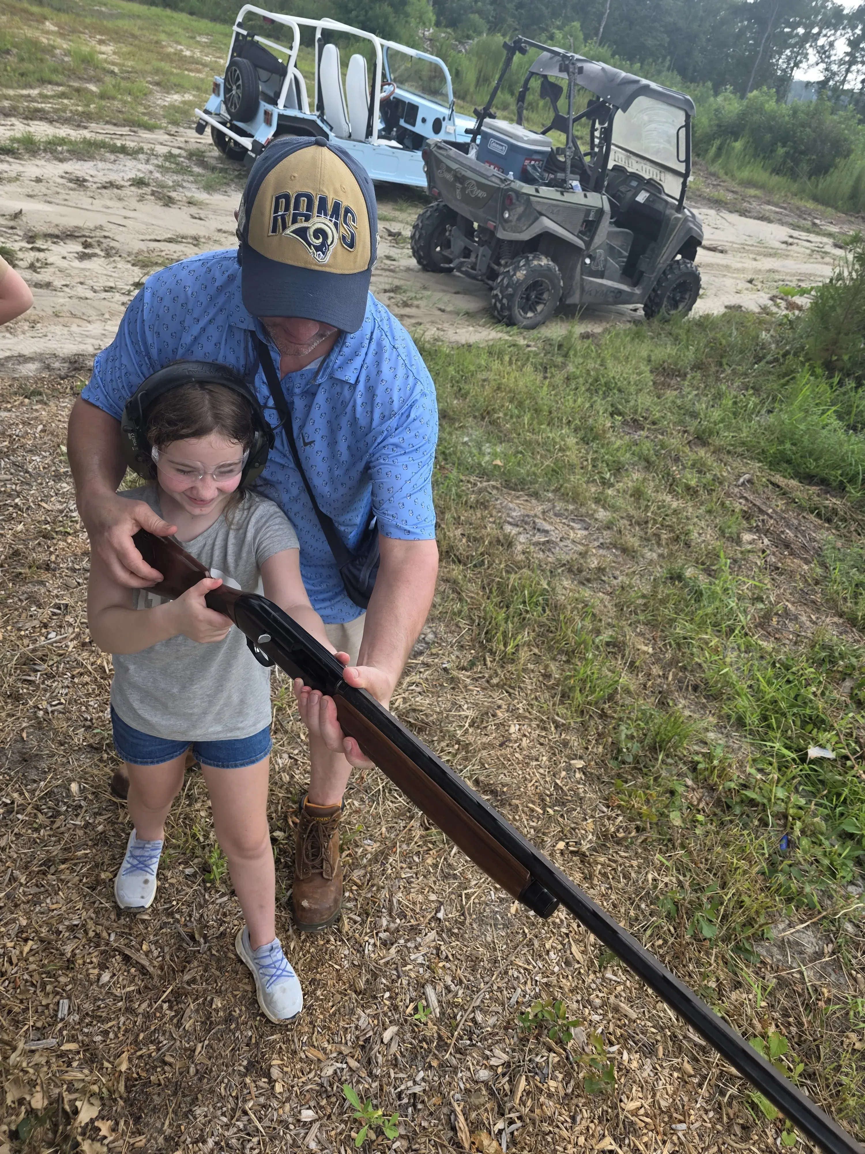 A young shooter getting shotgun instruction