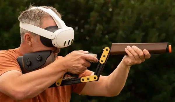 Member using virtual reality equipment for shotgun training at Traditions Field Club